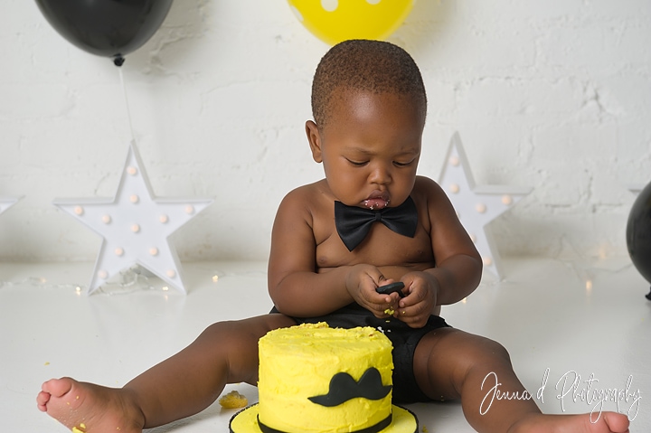 one year birthday baby photos yellow and black theme
