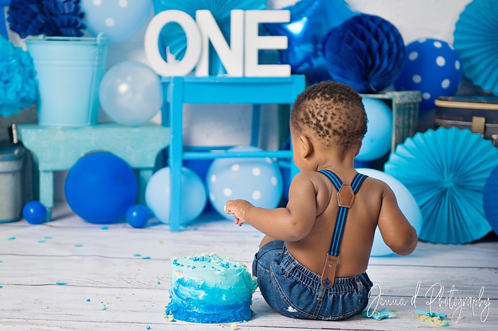 Blue and white first birthday cake smash celebration