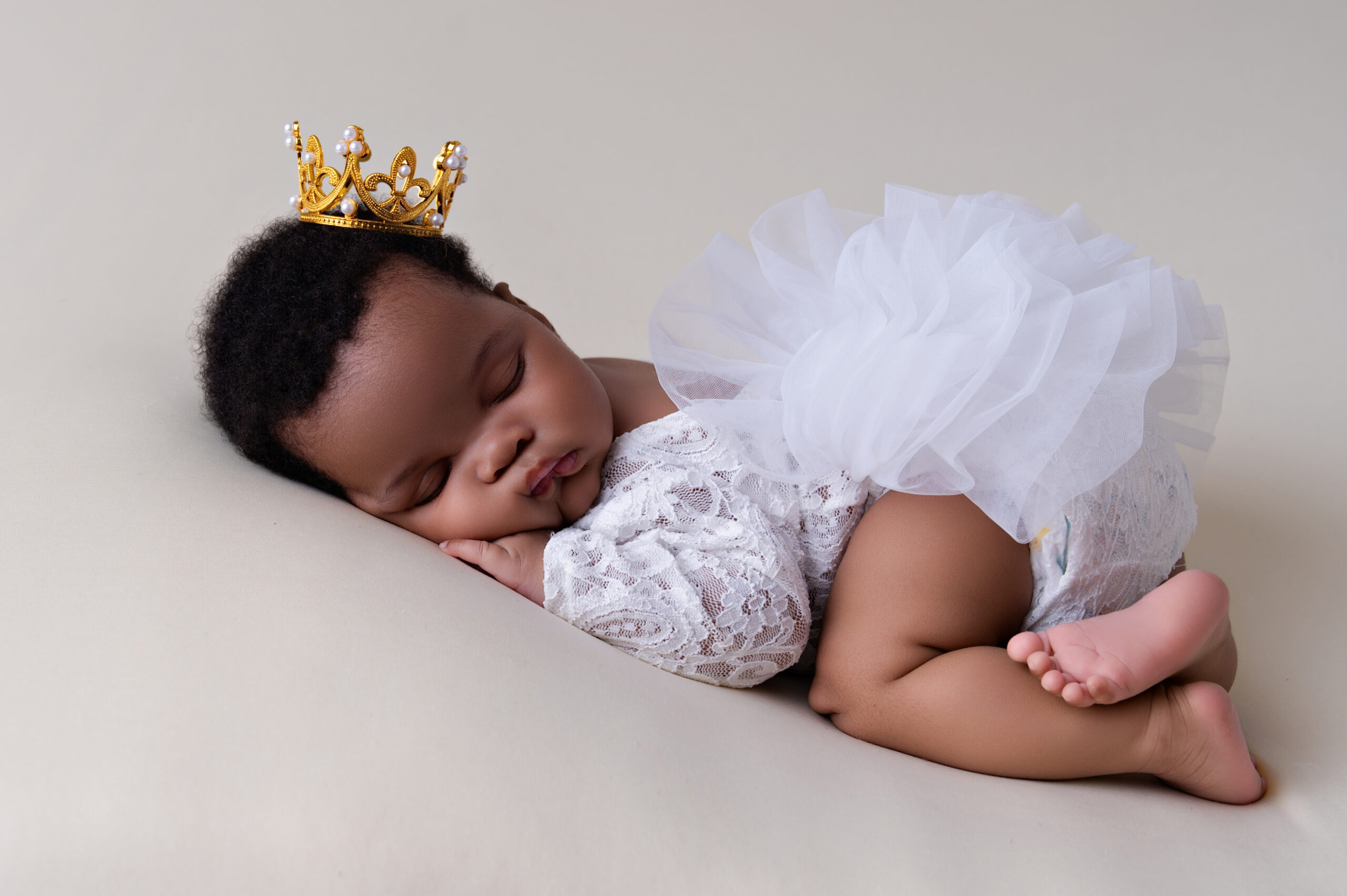 baby sleeping on her tummy