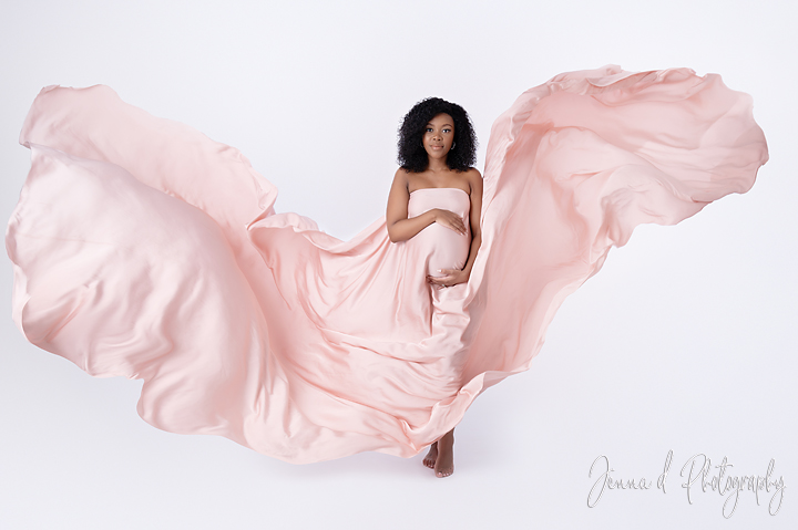 studi maternity shoot, pink fabric on white bacdrop