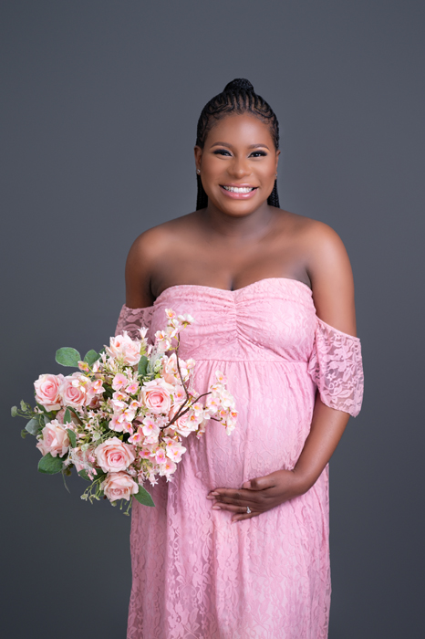 pregnant in pink dress with flowers