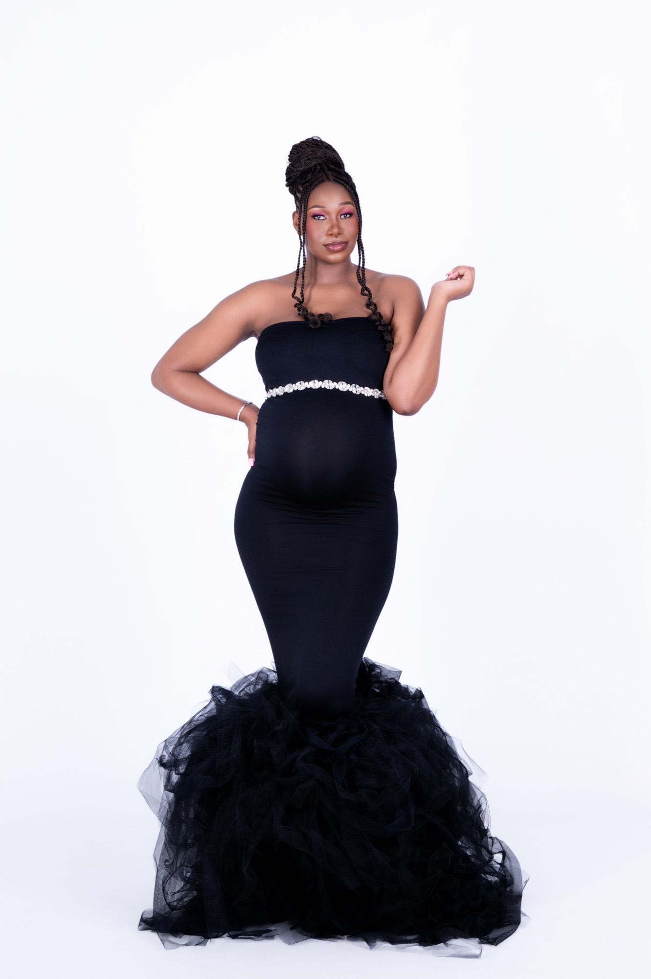 mom in black dress in photo studio