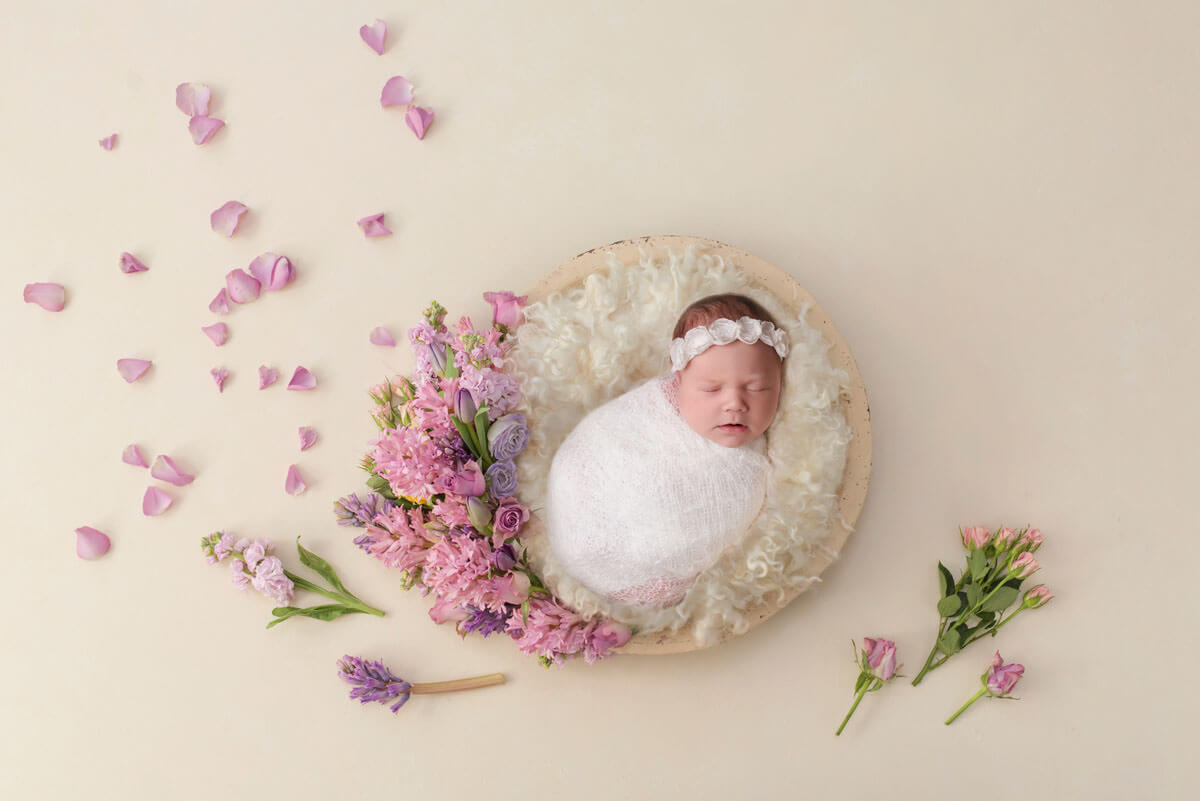 baby in basket showing gentle sleep training010