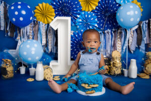 Bubble bath photo after cake smash with blue balloons and number one backdrop – 1st Birthday Cake Pretoria East