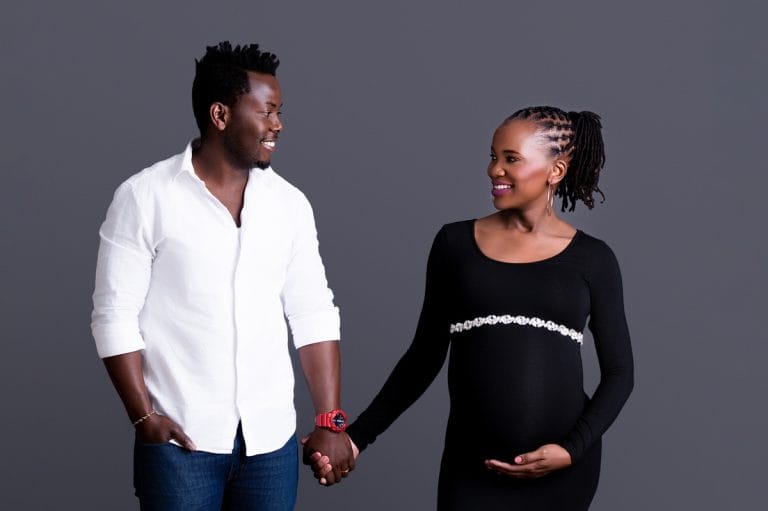 Maternity photoshoot in Pretoria studio — black gown solo portrait