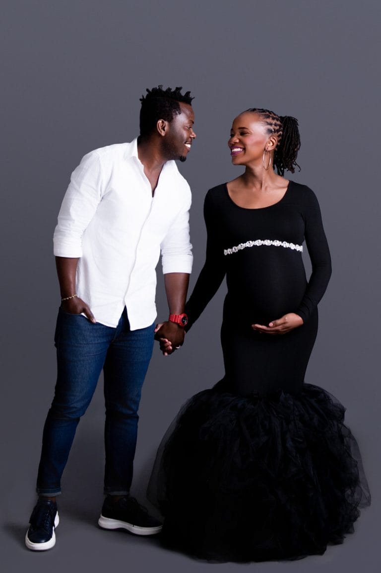 Maternity photoshoot in Pretoria studio — black gown solo portrait