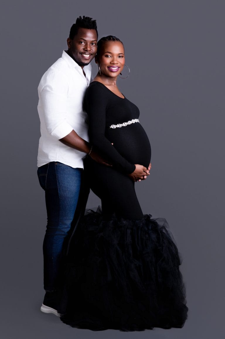 Maternity photoshoot in Pretoria studio — black gown solo portrait