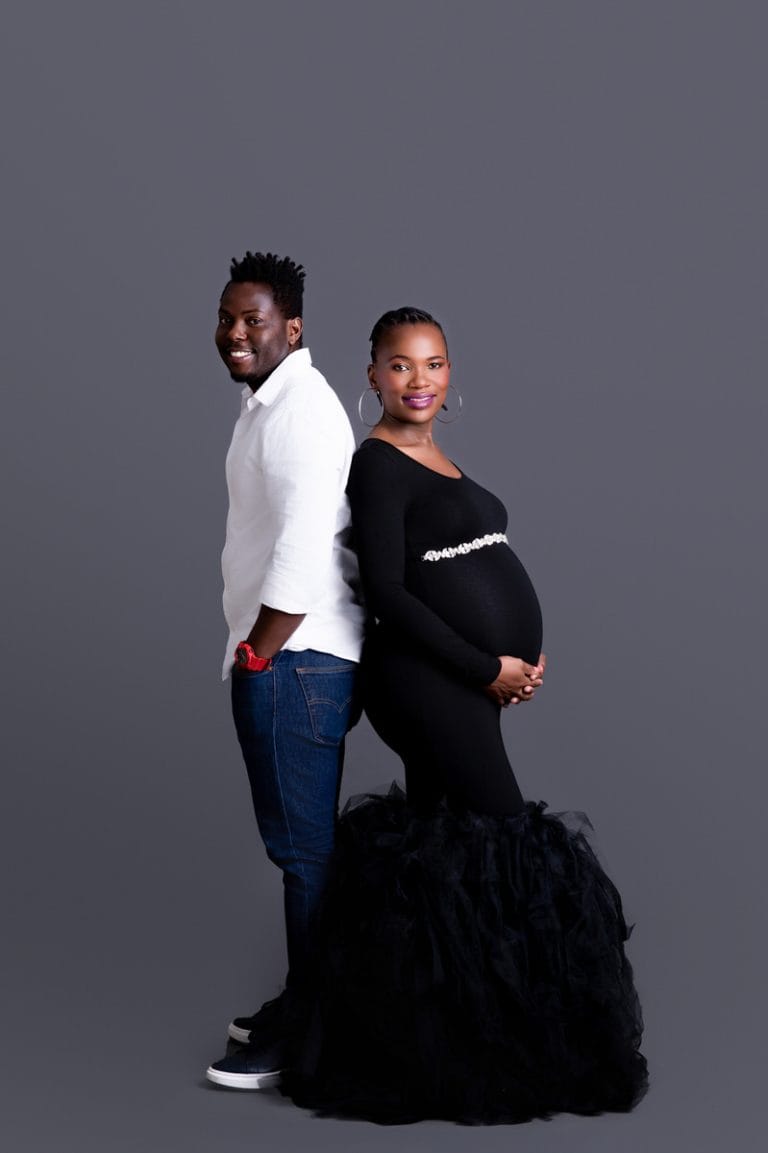 Maternity photoshoot in Pretoria studio — black gown solo portrait
