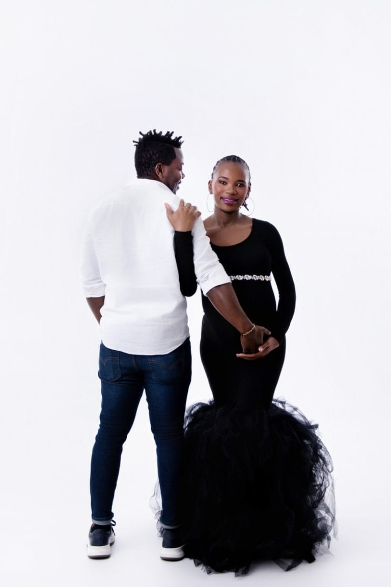 Maternity photoshoot in Pretoria studio — black gown solo portrait
