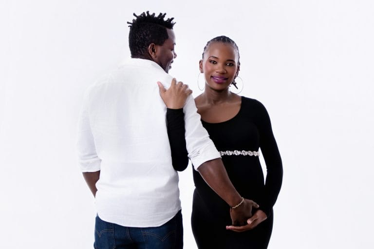 Maternity photoshoot in Pretoria studio — black gown solo portrait