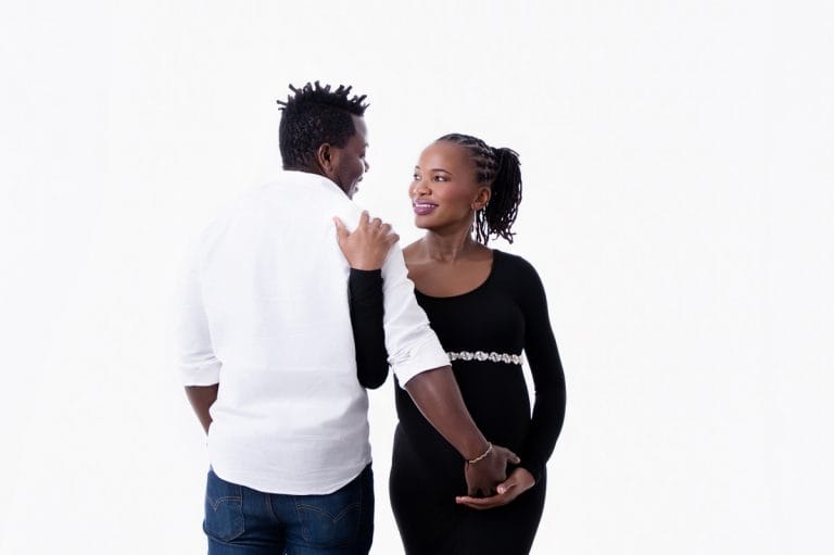 Maternity photoshoot in Pretoria studio — black gown solo portrait