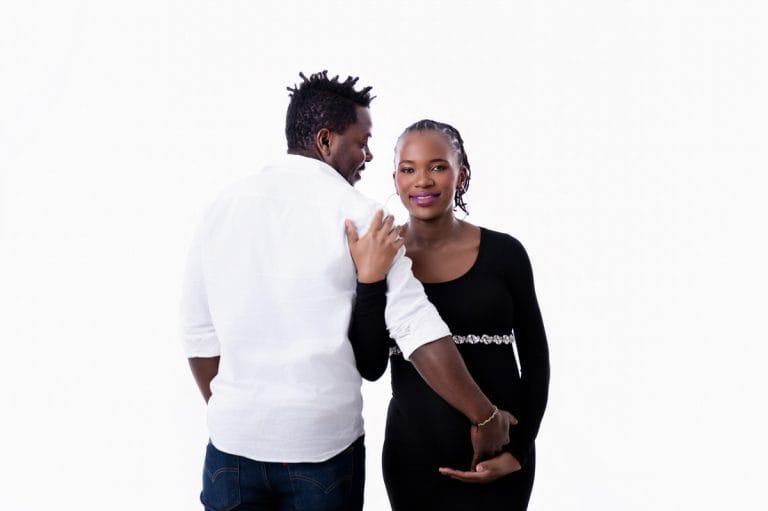Maternity photoshoot in Pretoria studio — black gown solo portrait