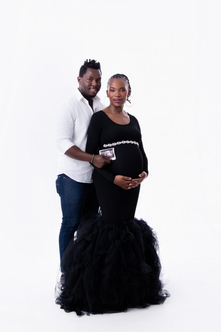 Maternity photoshoot in Pretoria studio — black gown solo portrait