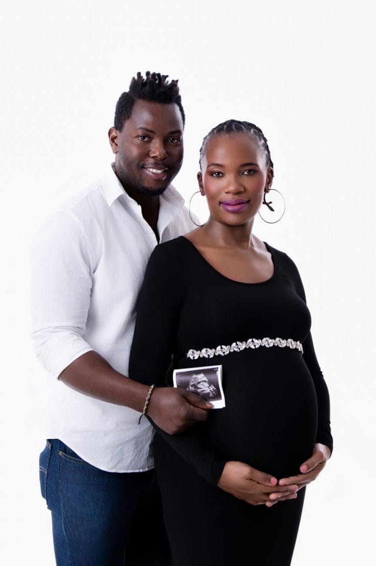 Maternity photoshoot in Pretoria studio — black gown solo portrait