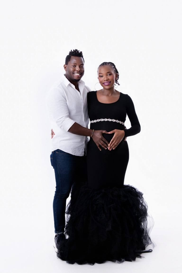 Maternity photoshoot in Pretoria studio — black gown solo portrait