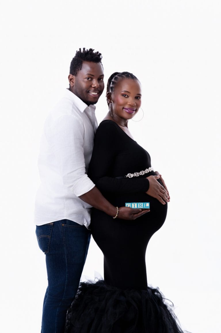 Maternity photoshoot in Pretoria studio — black gown solo portrait