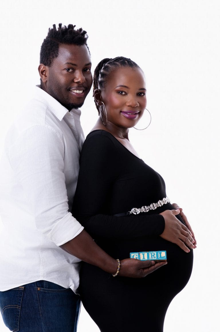 Maternity photoshoot in Pretoria studio — black gown solo portrait