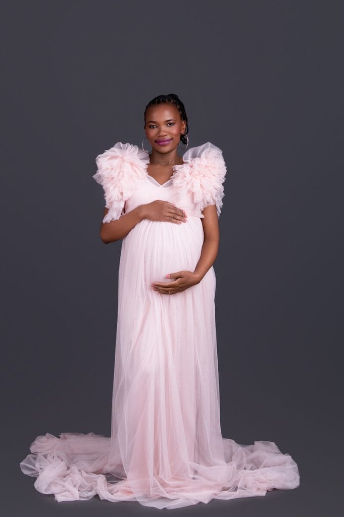 Soft pink maternity gown portrait in Pretoria studio