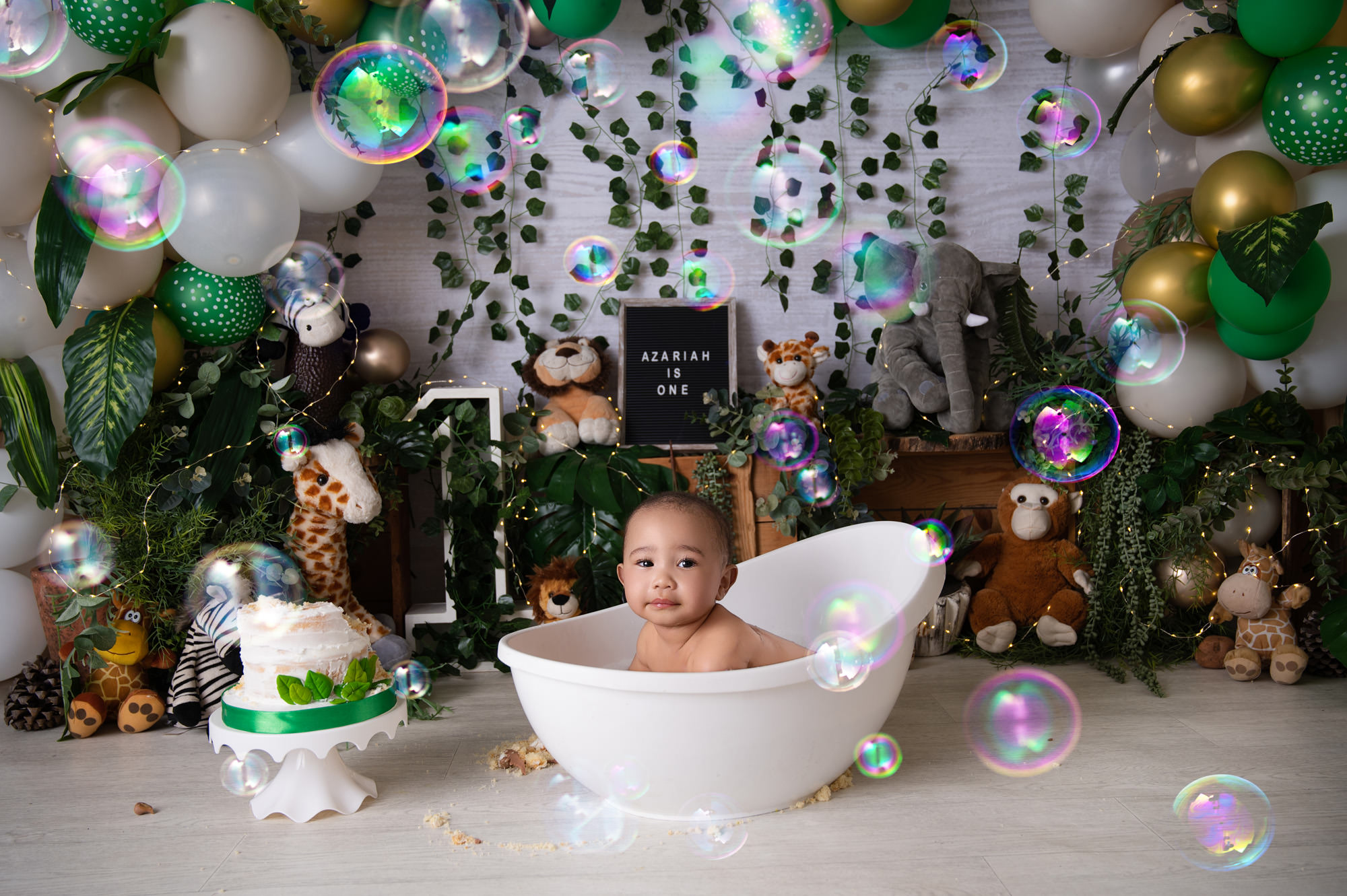 baby swimming in white bath 