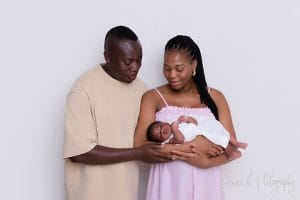 mom and dad with newborn