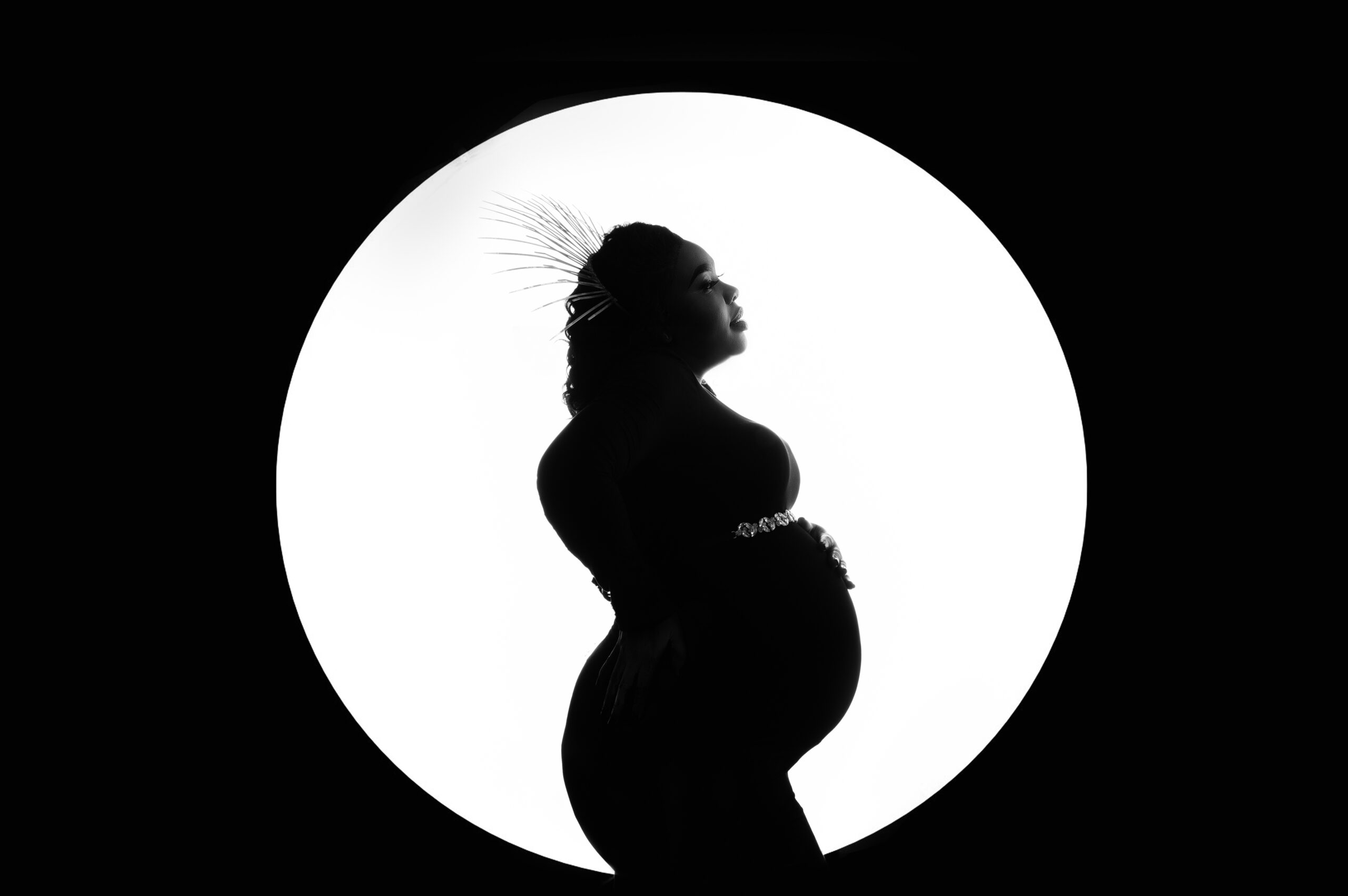 Striking silhouette maternity photo highlighting the beauty of pregnancy and the importance of Pretoria North birth support for expecting mothers.