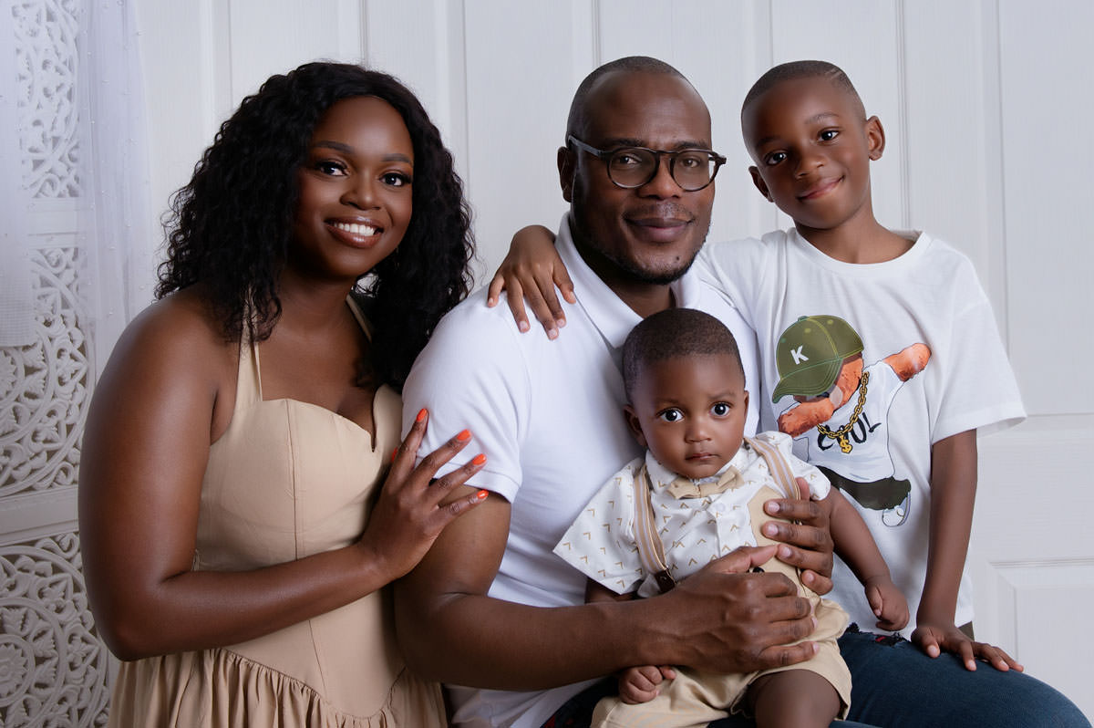 family photo prints vs digitals family posing in the studio